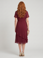 Eira™ | Elegante Midi Jurk met Gelaagde Zoom & Transparante Mouwen