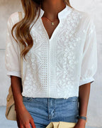 Blouse met V-hals en pofmouwen met kantdecoratie