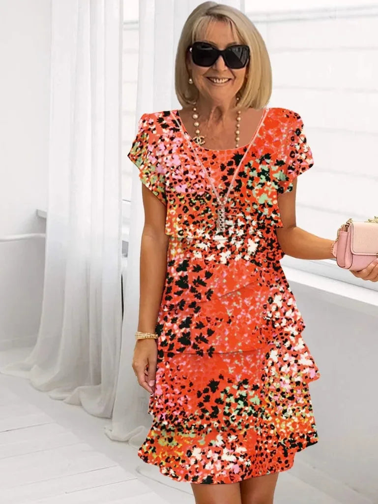 Brigitte – Elegante, vloeiende jurk met ruffles
